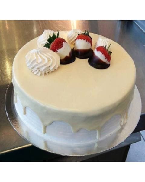 White Drip Strawberry Round Cake